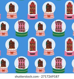 Festive snow globes featuring charming city houses