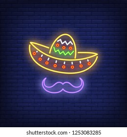 Festive sombrero and moustache neon sign. Mexican culture design. Night bright neon sign, colorful billboard, light banner. Vector illustration in neon style.