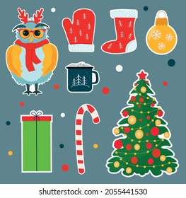 Festive stickers for Christmas and New Year. Pictures of gifts, Christmas tree, penguin, skates. Vector illustration.