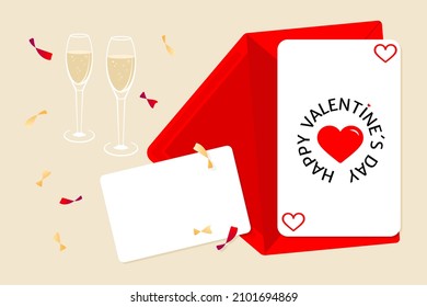 Composición festiva de tarjetas de San Valentín con sobre, tarjeta en blanco y dos vasos de chapagne