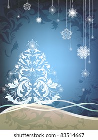 Festive winter background with white ornamental Christmas tree.