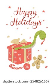 Festive winter holidays illustration with cheerful snake popping out red wrapped gift box with Christmas elements. Perfect for seasonal greetings and New Year. Vector hand drawn greeting card