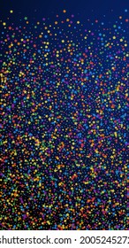 Festive worthy confetti. Celebration stars. Rainbow bright stars on dark blue background. Graceful festive overlay template. Vertical vector background.