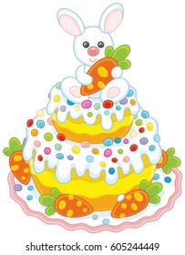 Festively decorated Easter cake with a small white bunny and carrots