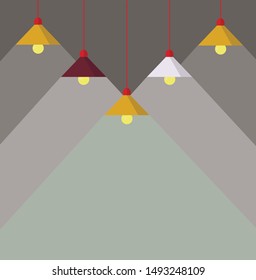 A few burning lamps hanging from the ceiling on a gray background