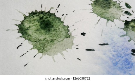 A few green watercolor blotches on a white and slightly blue background. Realistic Vector Image.