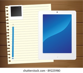 Fictitious touch tablet PC With blank paper and photo frame. on brown wood background. Vector template for design work