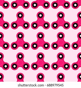 Fidget spinner. Hand toy for stress relief. Seamless pattern with pink spinners for wrapping paper, wallpaper, web page background and more. Vector illustration. EPS10.