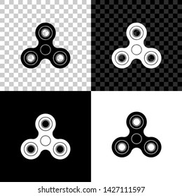 Fidget spinner icon isolated on black, white and transparent background. Stress relieving toy. Trendy hand spinner. Vector Illustration