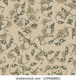 Field camouflage of various shades of green and beige colors. It is a colorful seamless pattern that can be used as a camo print for clothing and background and backdrop or computer wallpaper