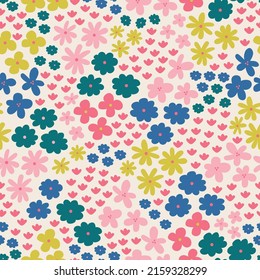 Field of colourful flowers, vector seamless pattern design. Pink, green, blue and yellow tones. Trendy summer and spring floral vibes. Abstract and modern elements. Matching patterns available. 