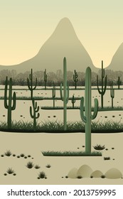A field with lots of cacti and grass on the background of mountains.
