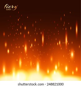 Fiery background. Blurred defocused lights. Fire bokeh. Vector eps10.