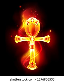 Fiery, orange, patterned, Egyptian ankh on dark background.