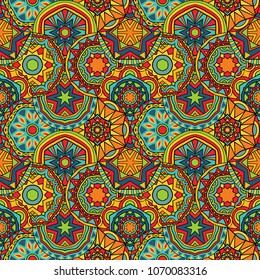 Fiesta seamless geometric pattern. Ornate Mexican style colorful fancy rounds arranged for ethnic ornament. Repeatable multicolored background. Vector illustration.