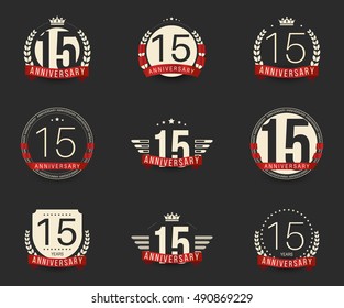 Fifteen years anniversary logotype with branches, ribbons, wings, crowns. 15th anniversary logo collection. Vector illustration.