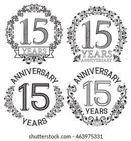 Fifteenth anniversary emblems set. Patterned celebration signs in vintage style.