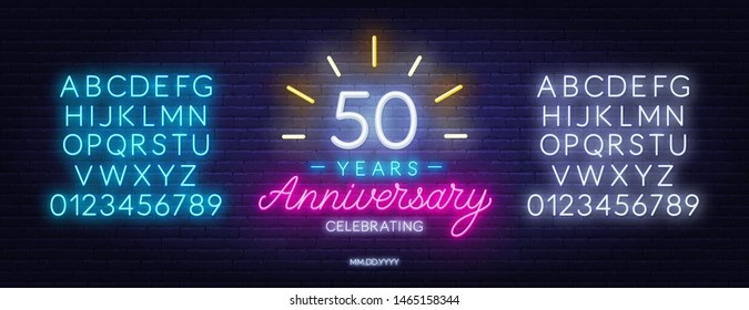 Fifty years anniversary neon sign on a dark background. Neon alphabet . Template for invitation or greeting card.