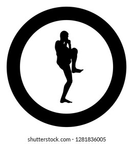 Fighter in fighting stancewith raised leg Man doing exercises Sport action male Workout silhouette side view icon black color vector illustration flat style simple imagein circle round