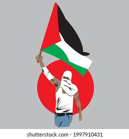 A fighter from the people of the State of Palestine, is fighting for the independence of his country with his right hand carrying the Palestinian flag.