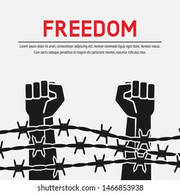 Fighting for freedom concept. Hands clenched into fist behind barbed wire