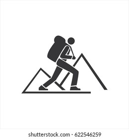 Figure of a man with a backpack in the background of mountains.