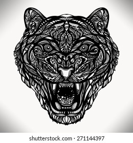 Figure vector wild animal tiger with a grin of decorative pattern of lines and dots. Can be used for printing, tattoos and jewelry for you. work of the author.