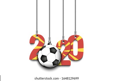 Figures 2020 in colors of the flag of the Northern Macedonia and soccer ball hanging on strings on an isolated background. Design pattern for banner, poster, flyer. Vector illustration