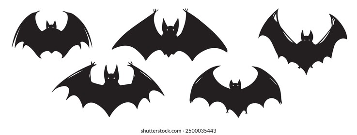 Figurines of black bats on a white background for Halloween. For holiday design and decor.