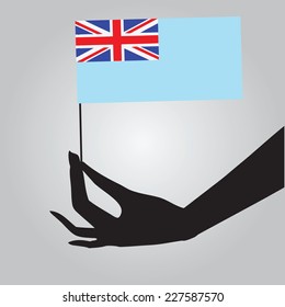 Fiji flag in a female hand. Vector illustration.