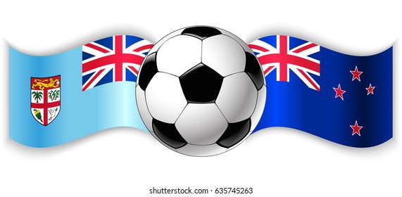 Fijian and NZ wavy flags with football ball. Fiji combined with New Zealand isolated on white. Football match or international sport competition concept.