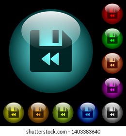 File fast backward icons in color illuminated spherical glass buttons on black background. Can be used to black or dark templates