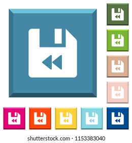 File fast backward white icons on edged square buttons in various trendy colors