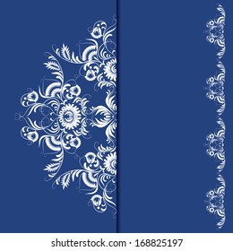 Filigree floral pattern on a blue background.