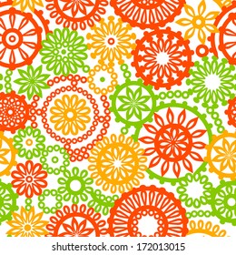 Filigree floral seamless pattern in orange green yellow and white, vector