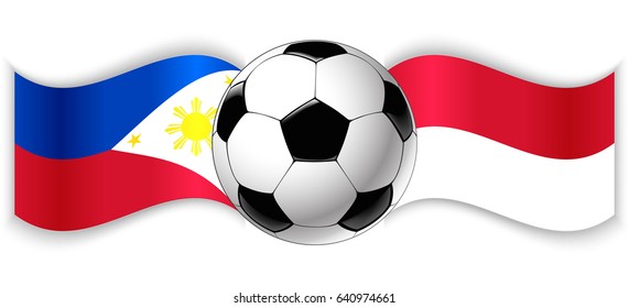 Filipino and Indonesian wavy flags with football ball. Philippines combined with Indonesia isolated on white. Football match or international sport competition concept.