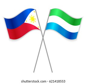 Filipino and Sierra Leonean crossed flags. Philippines combined with Sierra Leone isolated on white. Language learning, international business or travel concept.