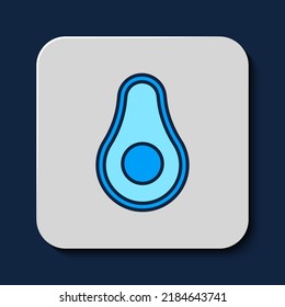 Filled outline Avocado fruit icon isolated on blue background.  Vector