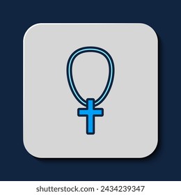 Filled outline Christian cross on chain icon isolated on blue background. Church cross.  Vector