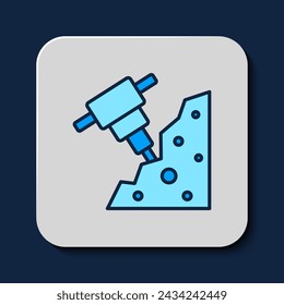 Icono de piedra y martillo de construcción aislado sobre fondo azul.  Vector
