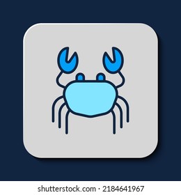 Filled outline Crab icon isolated on blue background.  Vector