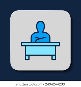 Filled outline Schoolboy sitting at desk icon isolated on blue background.  Vector