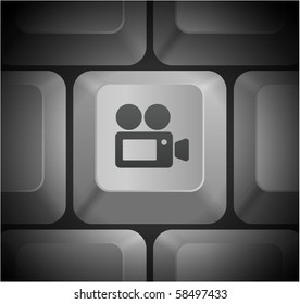 Filmkamera-Symbol auf der Original-Illustration der Computertastatur