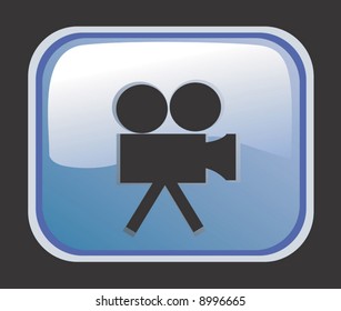  a film camera in light blue background	