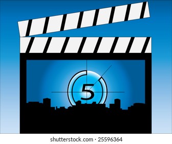 FILM clapper with glowing star & city concept