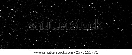 Film grain overlay. Vector snow effect pattern. Abstract starry night sky background. White speckles on black backdrop. Grungy gritty noisy urban texture. Random dots and flecks for old photo effect