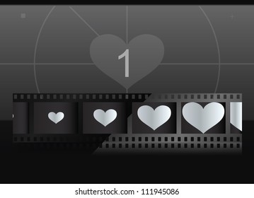 Film with heart in frames and screen on background. Vector