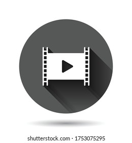 Film icon in flat style. Movie vector illustration on black round background with long shadow effect. Play video circle button business concept.