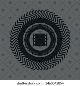 film icon inside black emblem