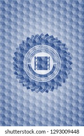 film icon inside blue emblem or badge with abstract geometric polygonal pattern background.